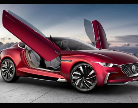 Red 2 door sports car with the doors open