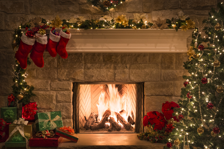Christmas fireplace, stockings, gifts, tree, copy space